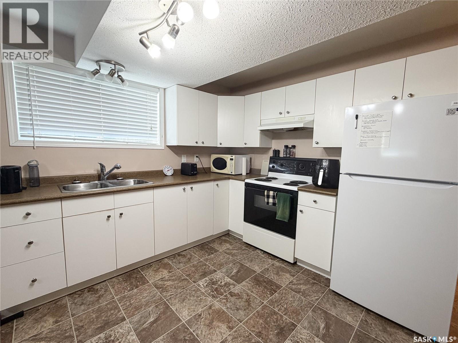 604 7th Avenue W, Meadow Lake, Saskatchewan  S9X 1B1 - Photo 33 - SK048321