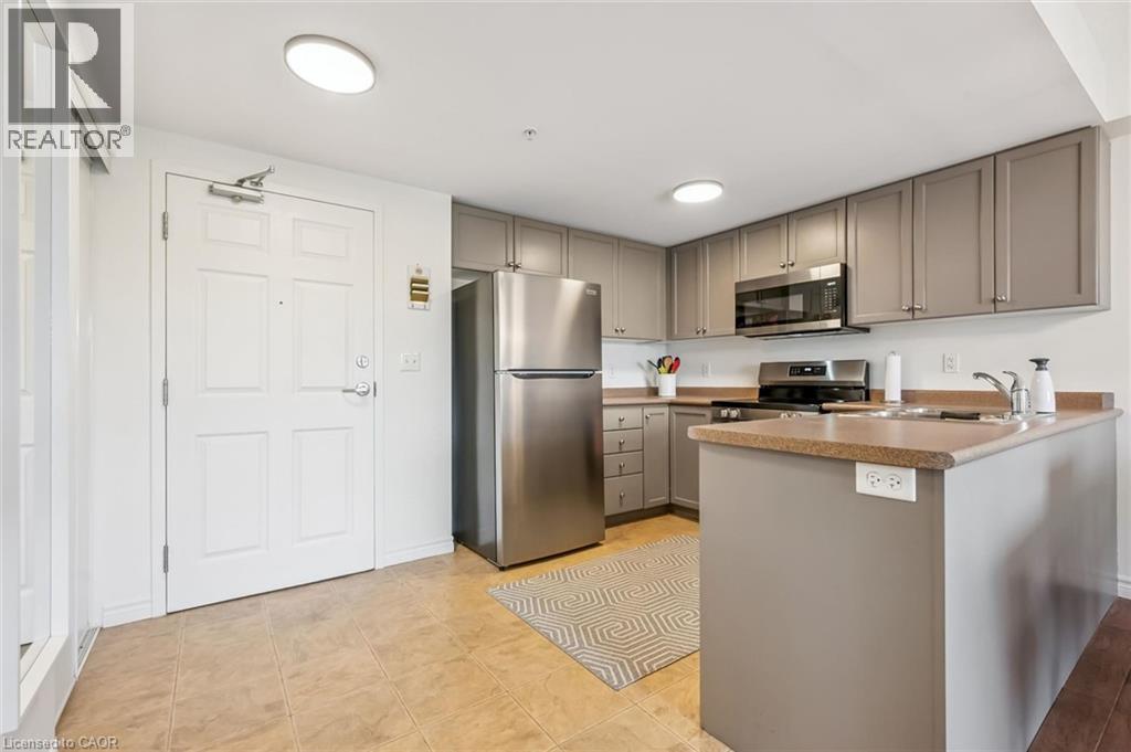 19 Waterford Drive Unit# 214, Guelph, Ontario  N1L 0G8 - Photo 5 - 40862503