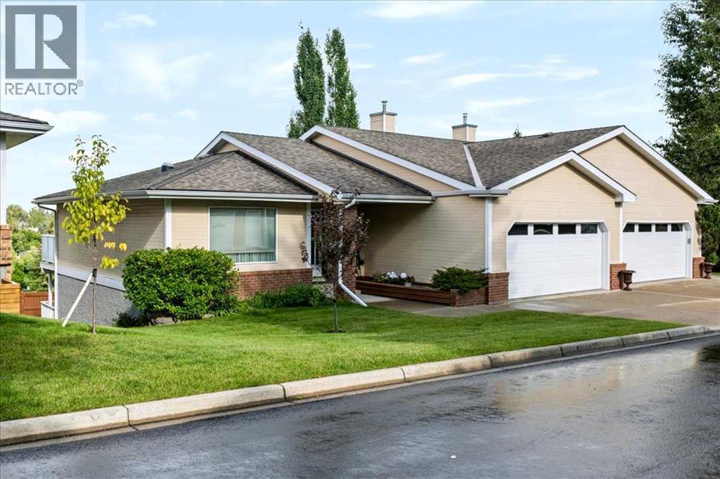 36, 140 Strathaven Circle SW, Calgary, Alberta  T3H 2N5 - Photo 1 - A2344630