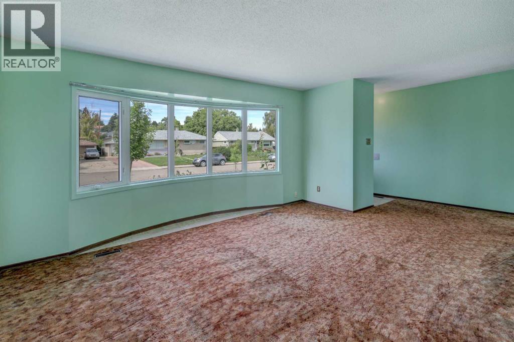 50 Thornlee Crescent Nw, Calgary, Alberta  T2K 2W8 - Photo 8 - A2342056