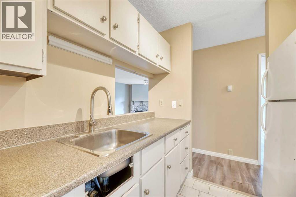 111, 10120 Brookpark Boulevard Sw, Calgary, Alberta  T2W 3G3 - Photo 30 - A2338587