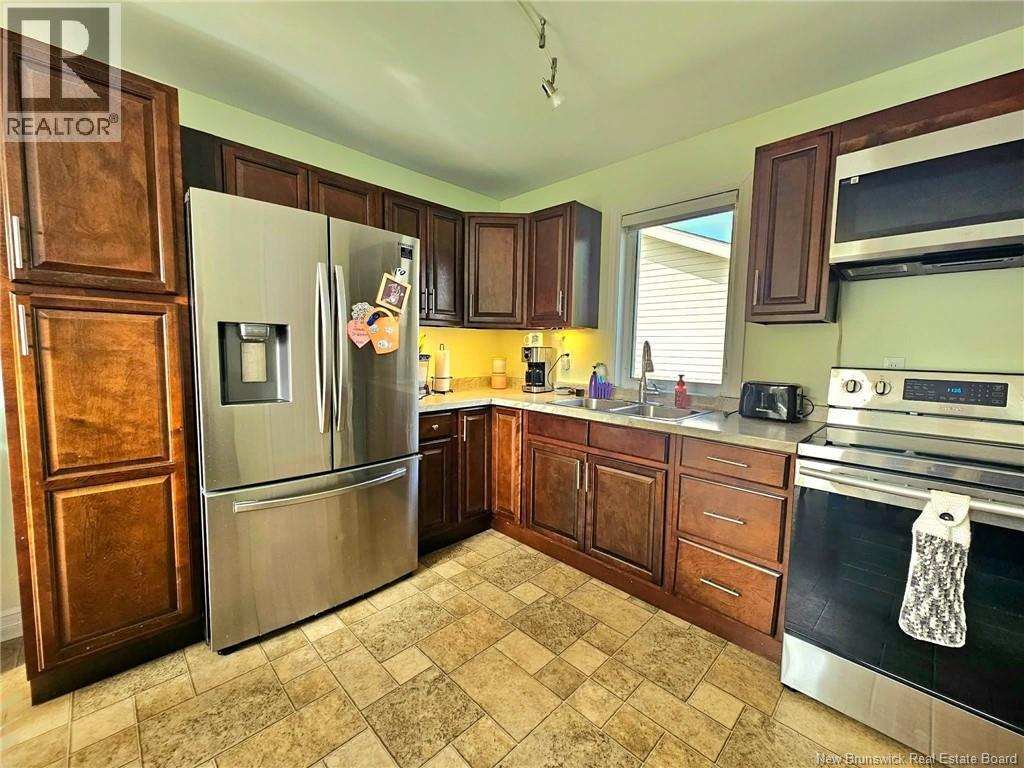 80 Rue De La Gare, Pointe-Verte, New Brunswick  E8J 2Z1 - Photo 17 - NB147592