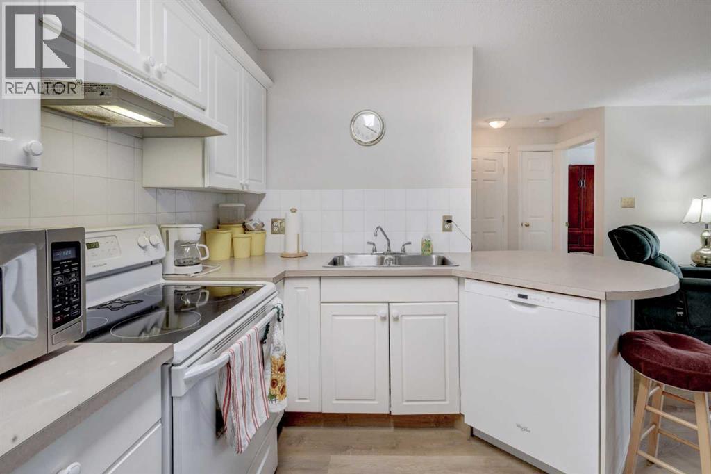 101, 6800 Hunterview Drive NW, Calgary, Alberta  T2K 6K5 - Photo 7 - A2305352
