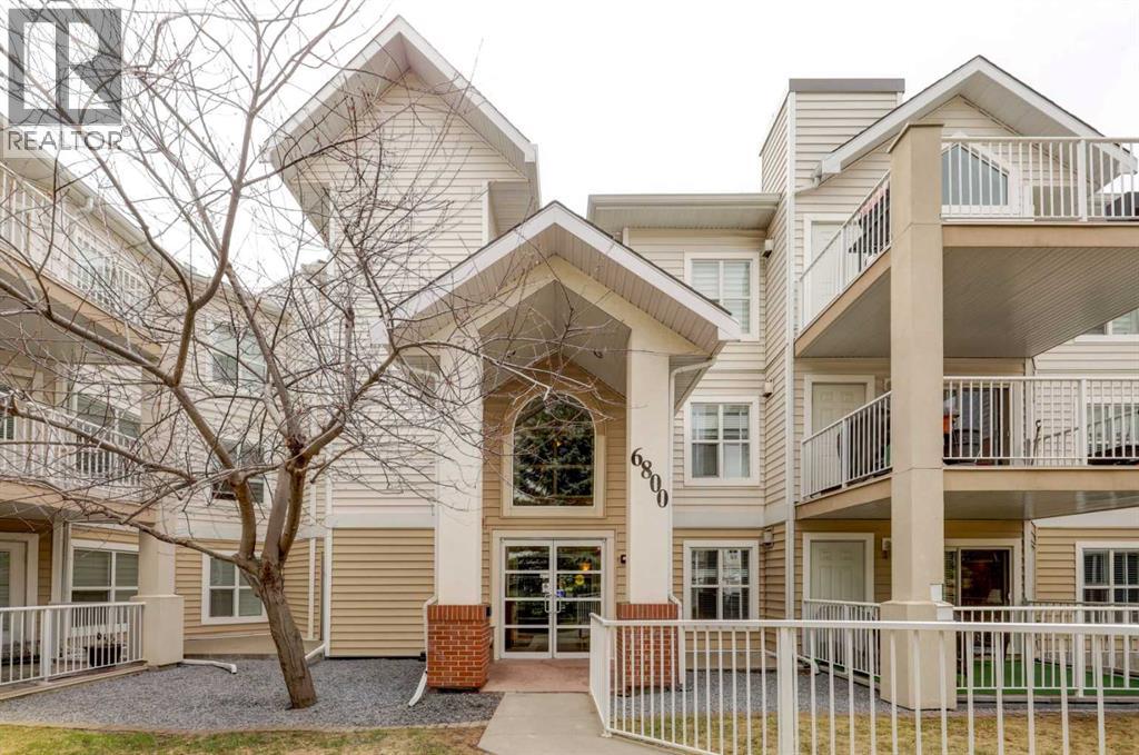 101, 6800 Hunterview Drive NW, Calgary, Alberta  T2K 6K5 - Photo 1 - A2305352