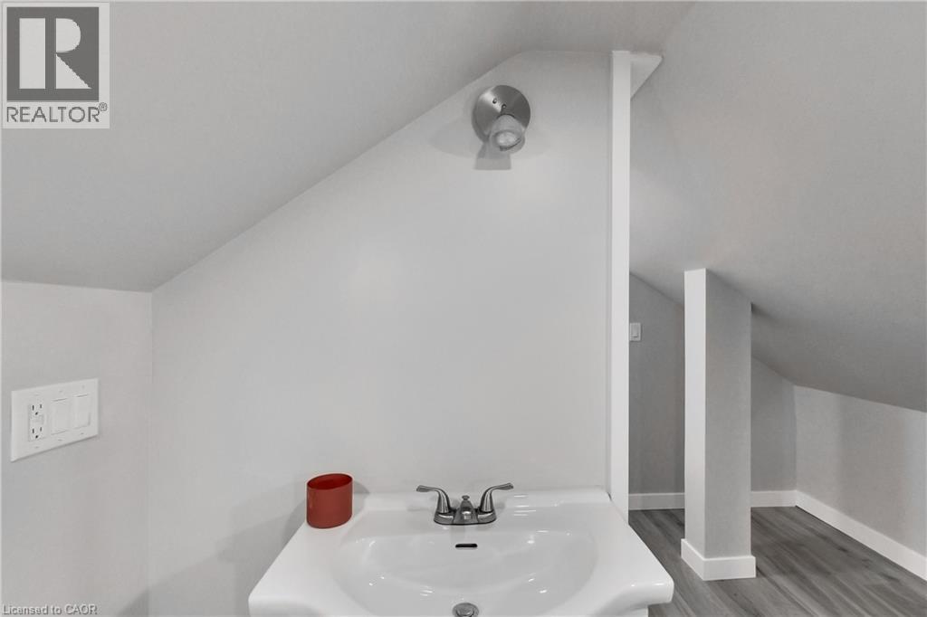 Pedestal sink with chrome-finish faucet