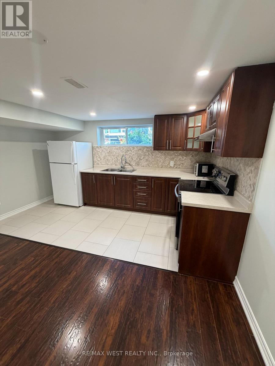 15 Macleod Street, Toronto, Ontario  M6L 2M7 - Photo 2 - W13784906