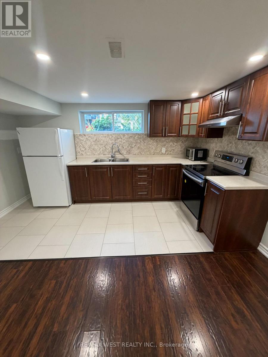 15 Macleod Street, Toronto, Ontario  M6L 2M7 - Photo 3 - W13784906