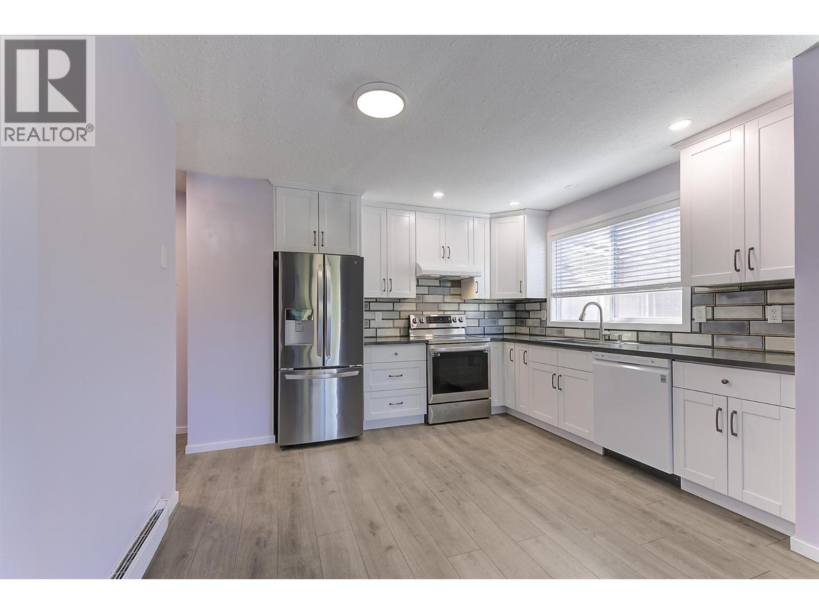 625 Rowcliffe Avenue Unit# 101, Kelowna, British Columbia  V1Y 5Y8 - Photo 6 - 10400516
