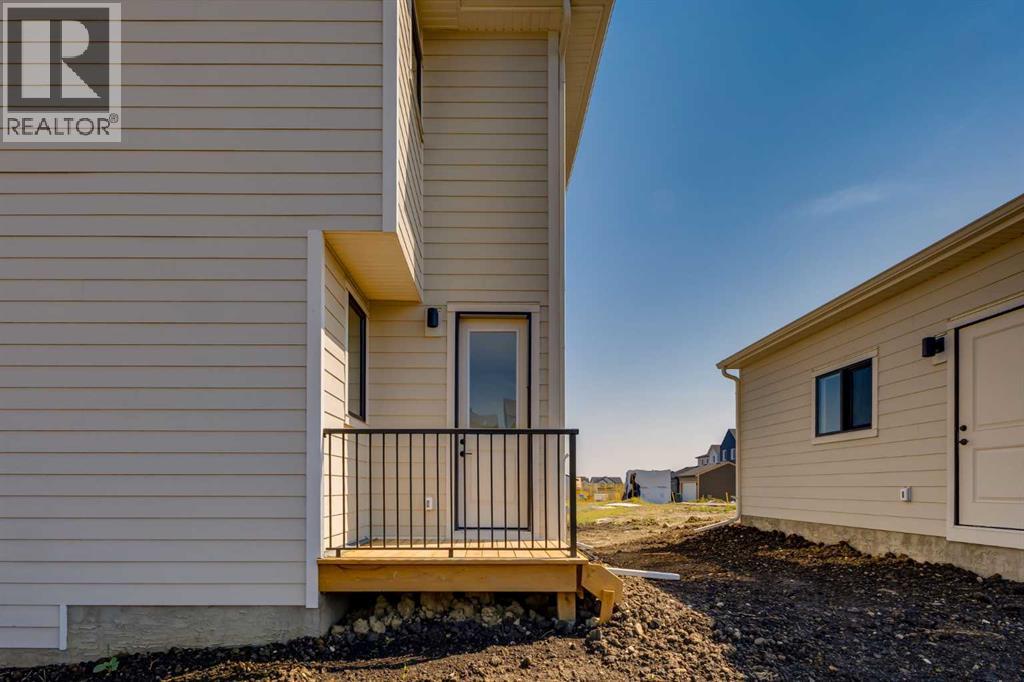 88 Bluerock Terrace Sw, Calgary, Alberta  T2Y 0V7 - Photo 45 - A2334241