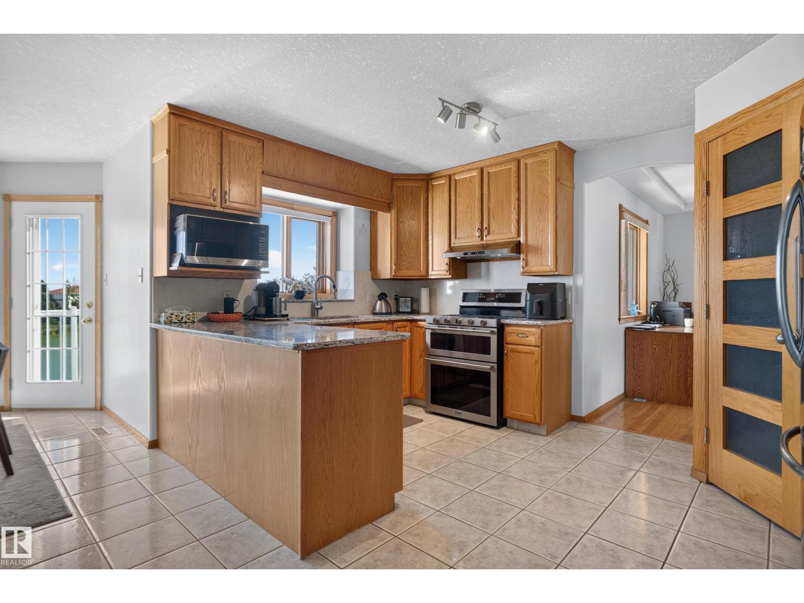15819 58 St Nw, Edmonton, Alberta  T5Y 2R4 - Photo 9 - E4508729