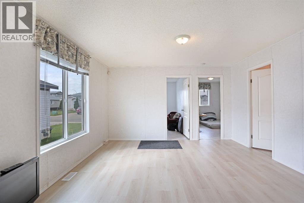 8 Meadowplace Crescent E, Brooks, Alberta  T1R 0R5 - Photo 20 - A2342227