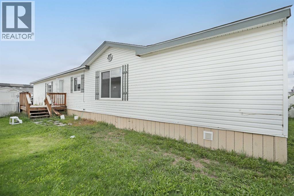 8 Meadowplace Crescent E, Brooks, Alberta  T1R 0R5 - Photo 29 - A2342227