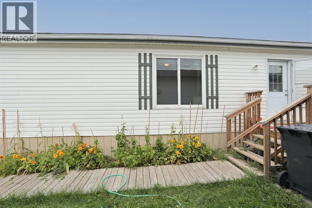 8 Meadowplace Crescent E, Brooks, Alberta  T1R 0R5 - Photo 30 - A2342227