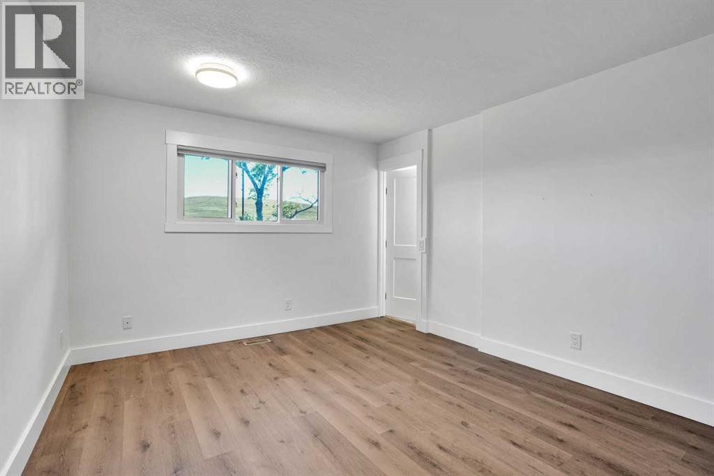 5702 Brenner Crescent NW, Calgary, Alberta  T2L 1z4 - Photo 7 - A2312004