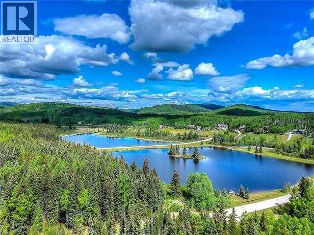 348 Wild Rose Close, Bragg Creek, Alberta  T0L 0K0 - Photo 39 - A2325129