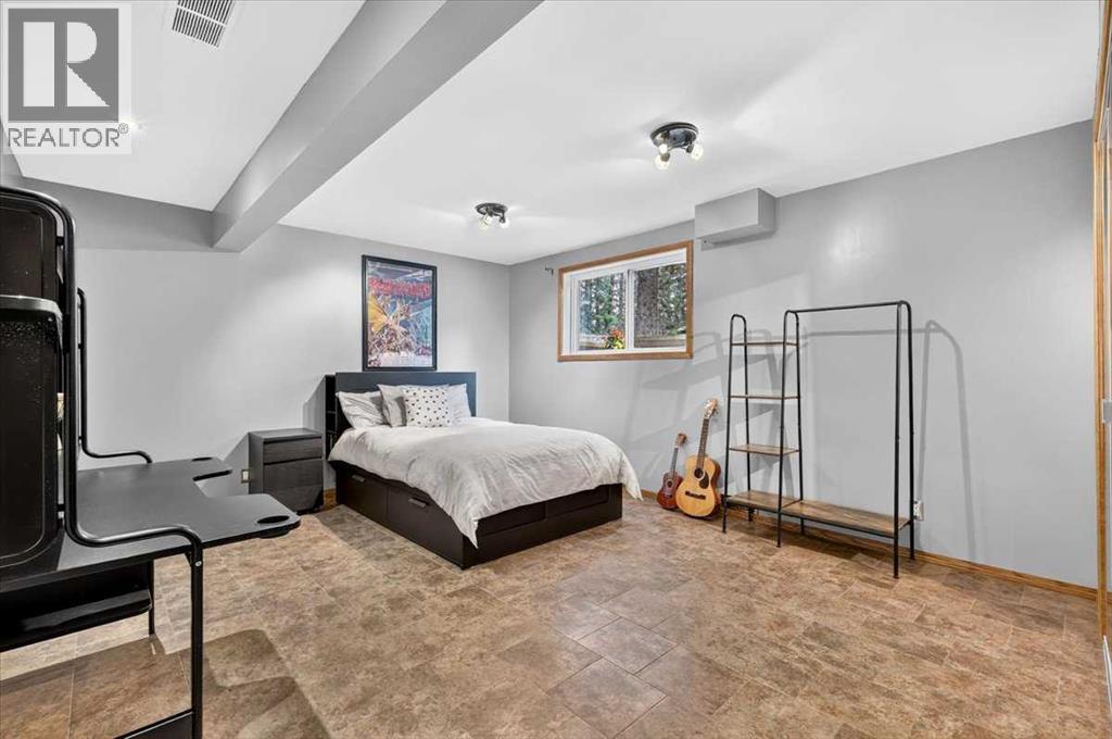 348 Wild Rose Close, Bragg Creek, Alberta  T0L 0K0 - Photo 32 - A2325129