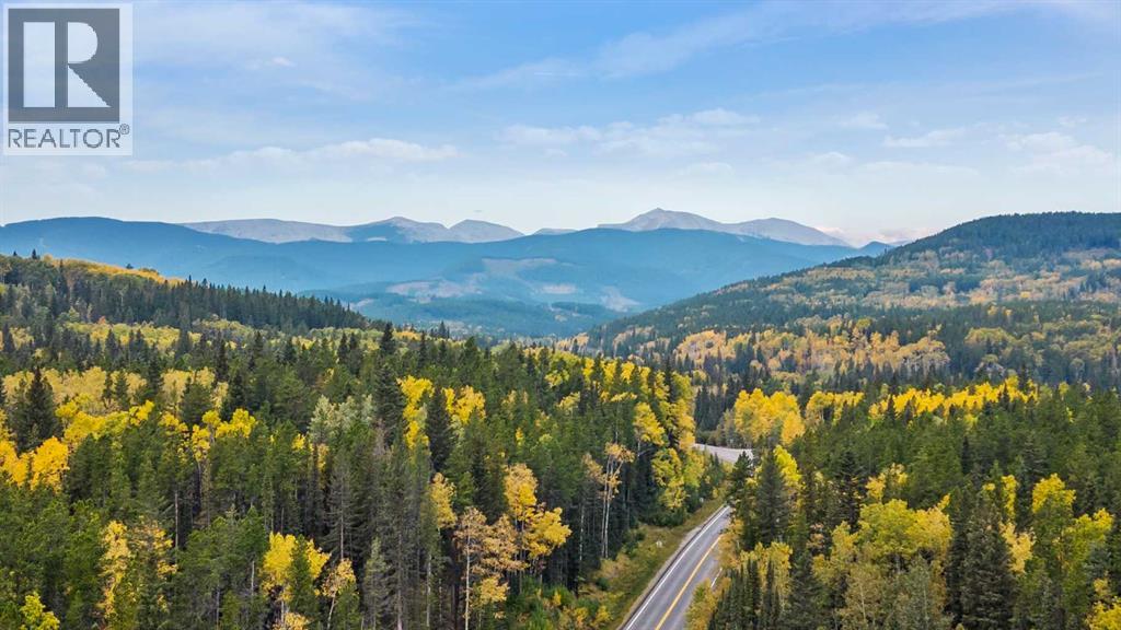 348 Wild Rose Close, Bragg Creek, Alberta  T0L 0K0 - Photo 44 - A2325129