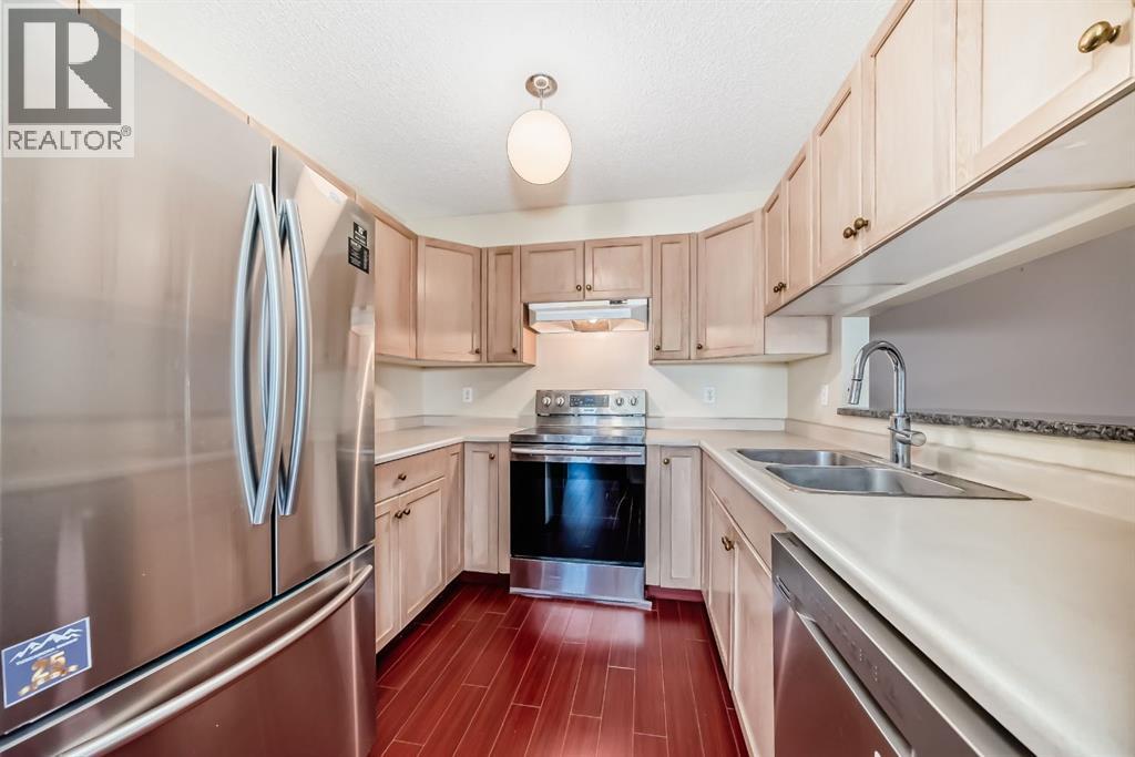 3308, 3308 Tuscarora Manor Nw, Calgary, Alberta  T3L 2J9 - Photo 4 - A2344709