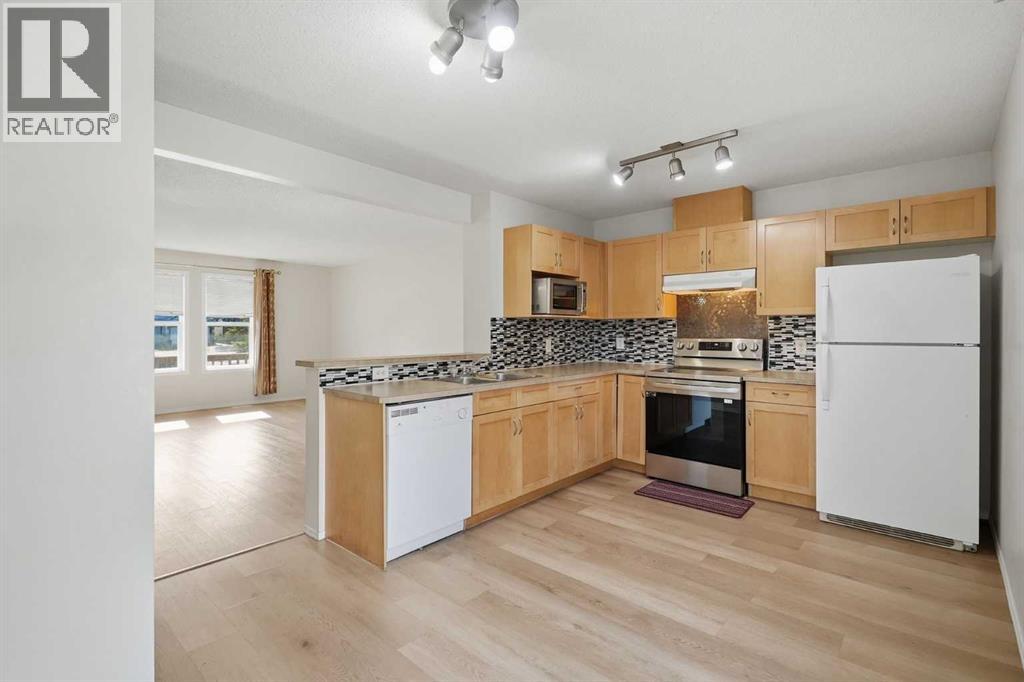 55 Panatella Park, Calgary, Alberta  T3K 6L5 - Photo 10 - A2345716