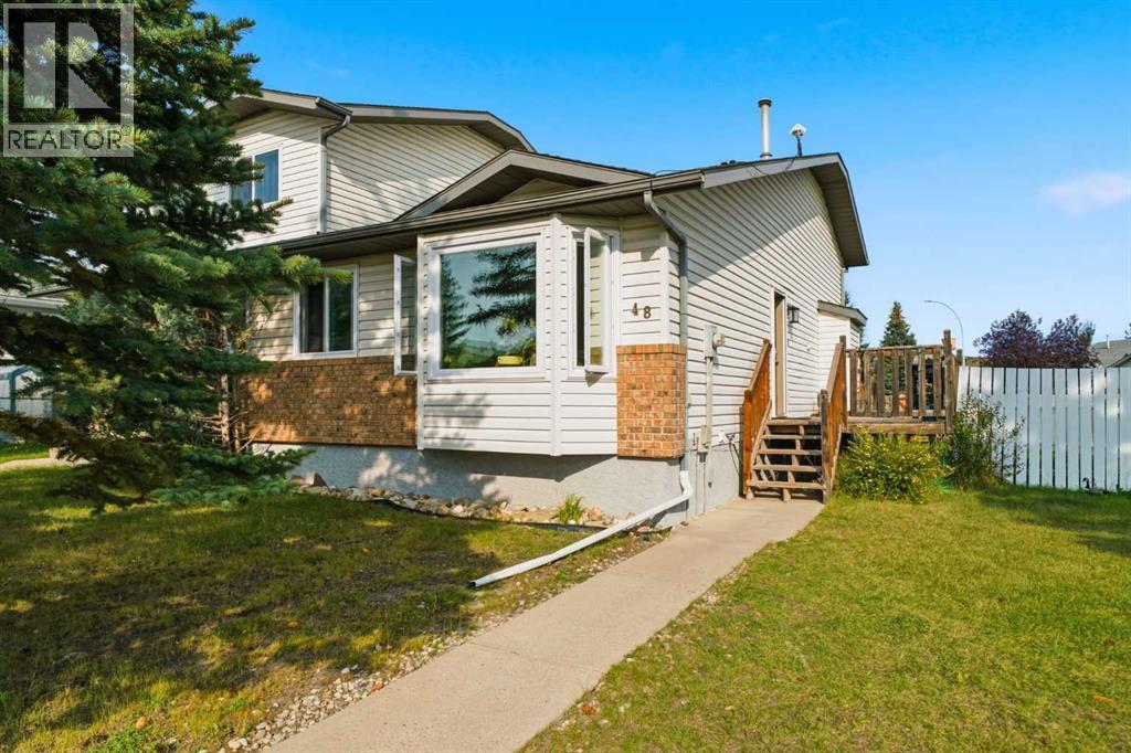 48 West Aarsby Road, Cochrane, Alberta  T4C 1L3 - Photo 1 - A2341434