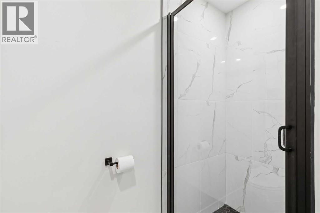 507 Cantrell Drive Sw, Calgary, Alberta  T2W 2K8 - Photo 36 - A2342874