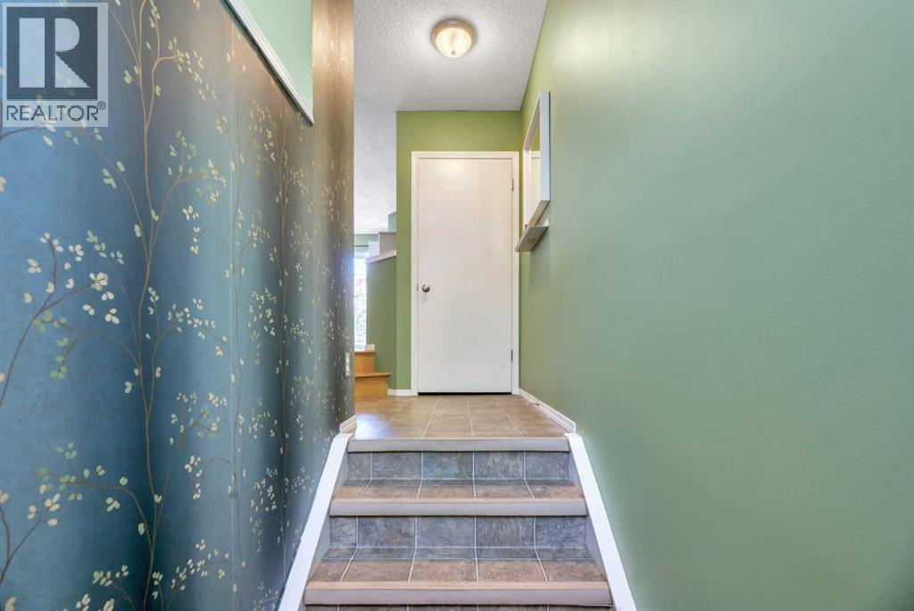 101 Tuscany Springs Gardens Nw, Calgary, Alberta  T3L 2R4 - Photo 4 - A2345189