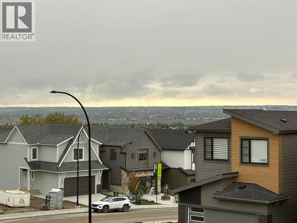153 Osprey Hill Way Sw, Calgary, Alberta  T3B 6S4 - Photo 2 - A2342576
