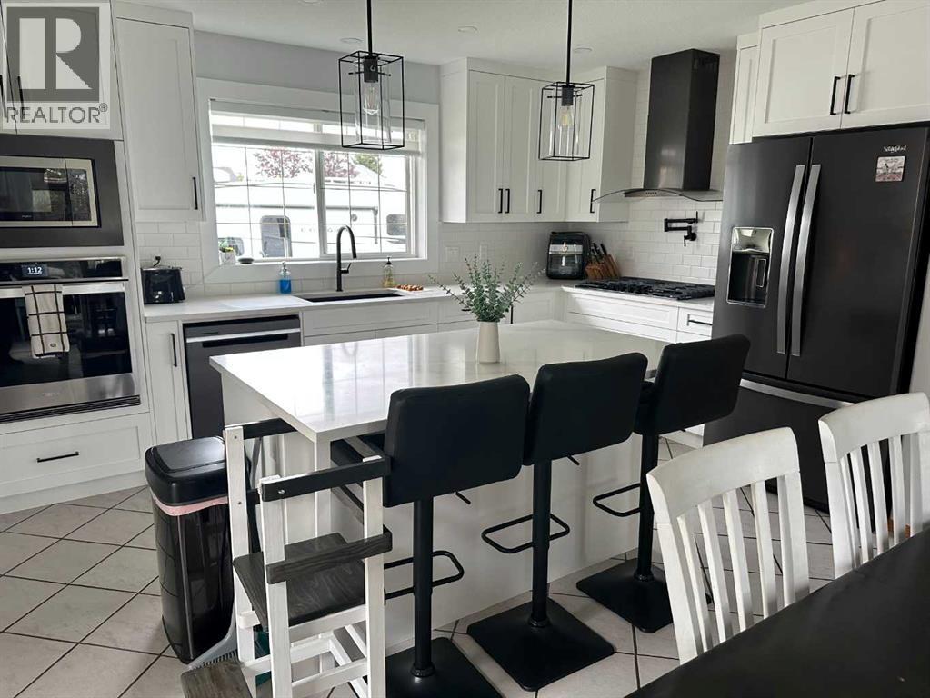 8 Westpoint Drive, Didsbury, Alberta  T0M 0W0 - Photo 7 - A2345427