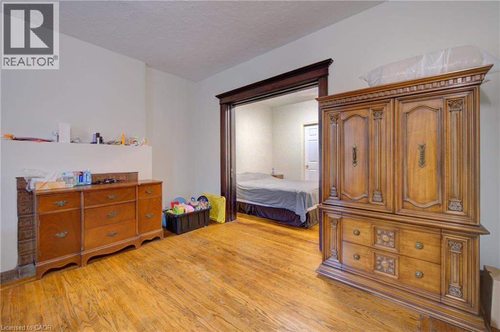private livingroom for Primary bedroom 1 with private 3 piece ensuite bath. pocket doors