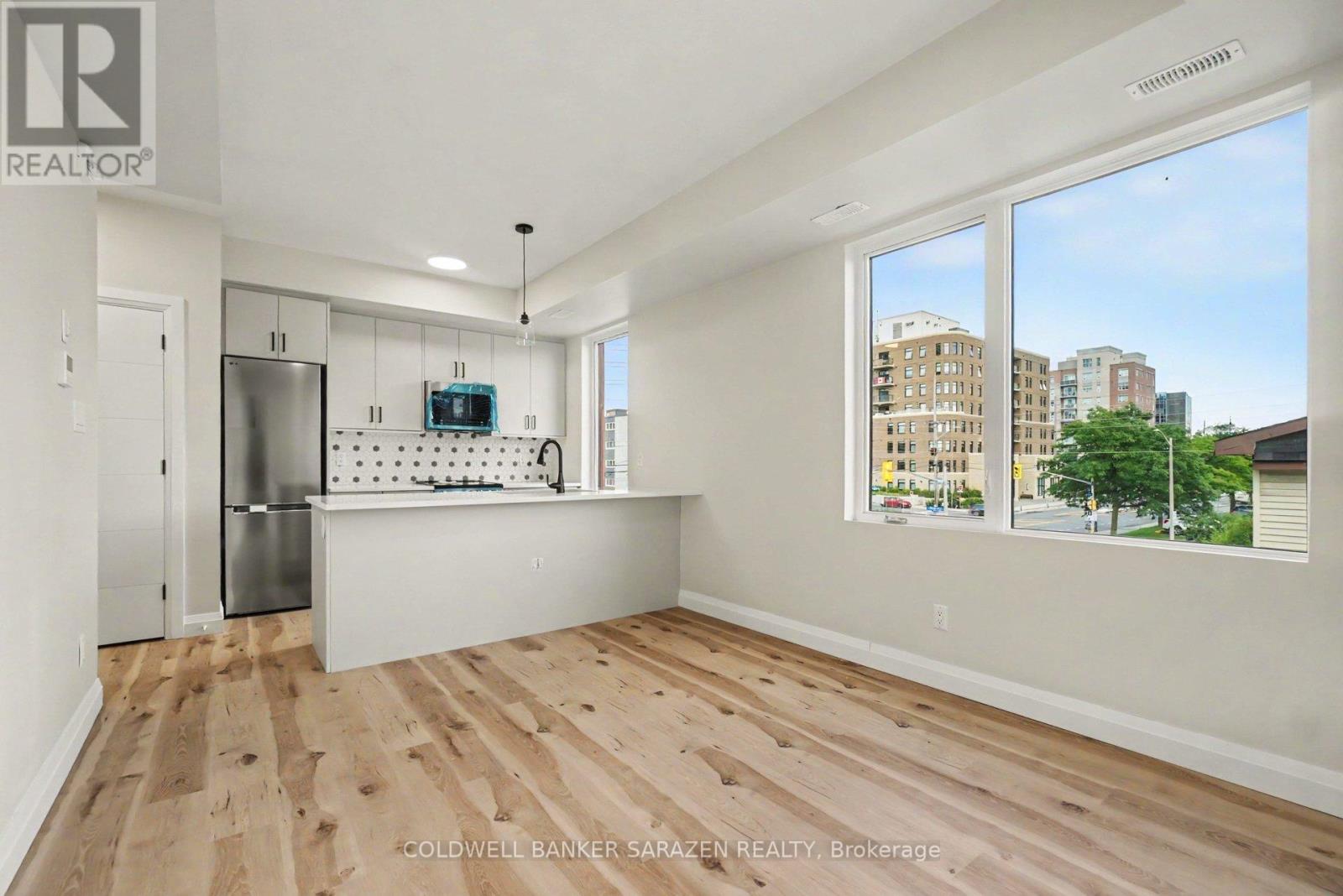 303 - 42 Mcarthur Avenue, Ottawa, Ontario  K1L 6R2 - Photo 2 - X13794466