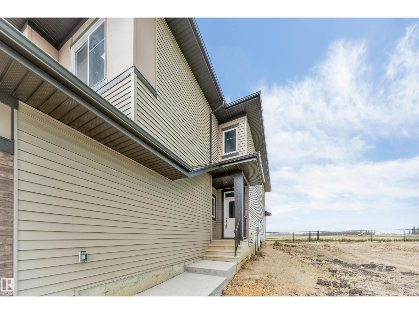 208 Falcon Cr, Leduc, Alberta  T0B 3M3 - Photo 3 - E4509011