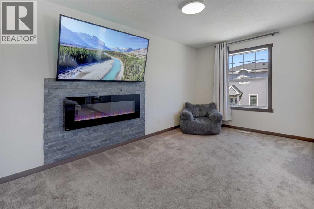 5 Covecreek Mews NE, Calgary, Alberta T3K 0V8 - Photo 19 - A2324736
