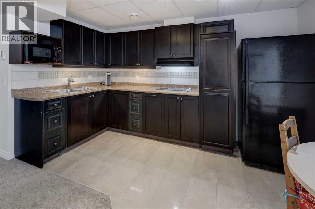5 Covecreek Mews NE, Calgary, Alberta T3K 0V8 - Photo 28 - A2324736