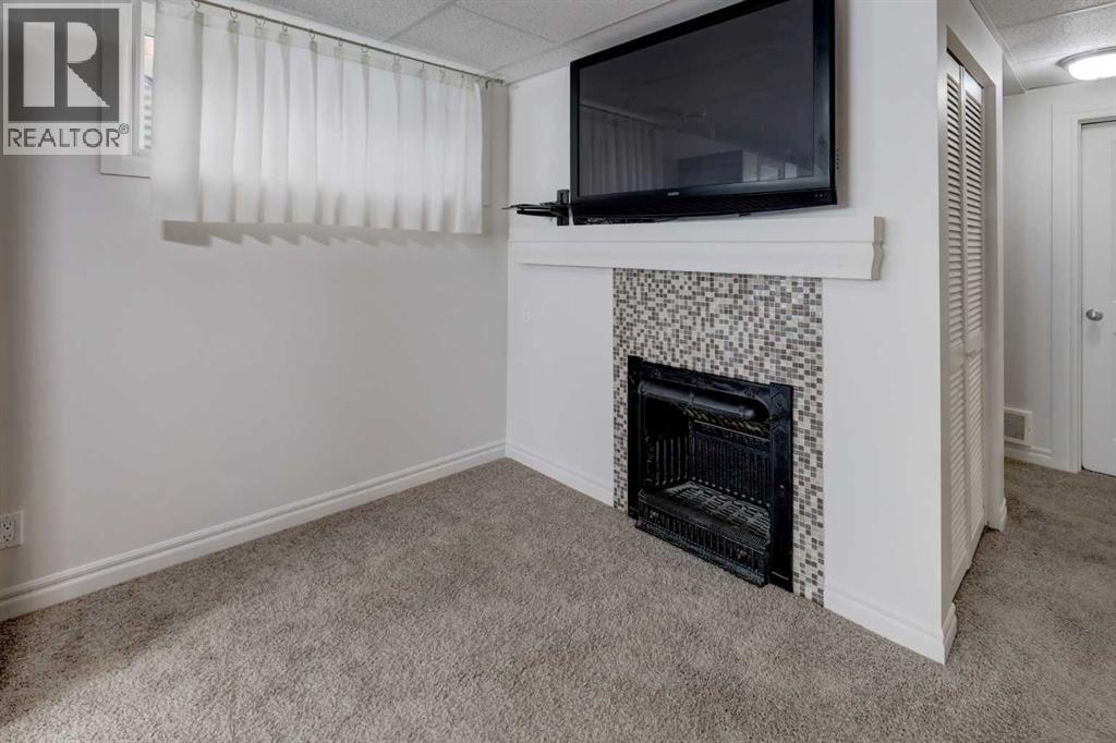 5 Covecreek Mews NE, Calgary, Alberta T3K 0V8 - Photo 30 - A2324736