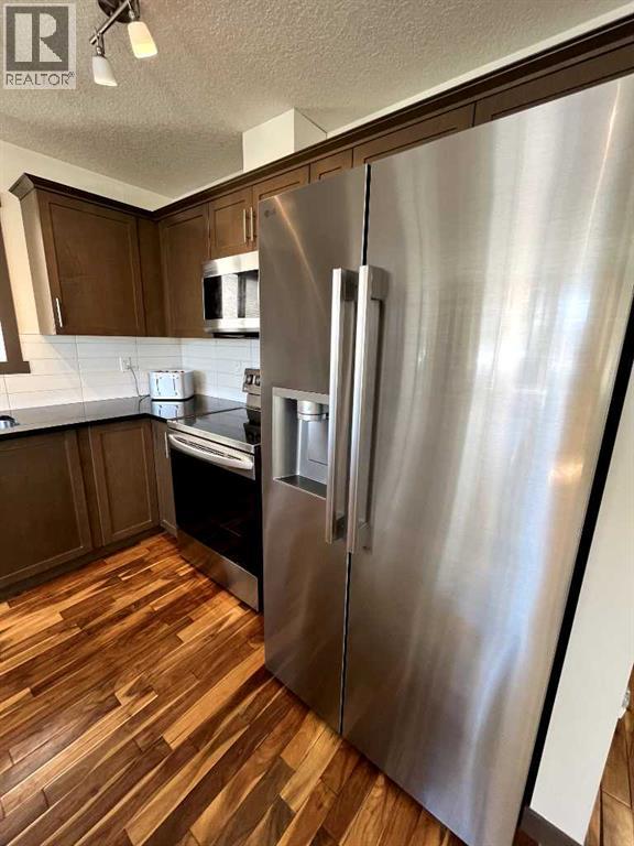 5 Covecreek Mews NE, Calgary, Alberta T3K 0V8 - Photo 46 - A2324736