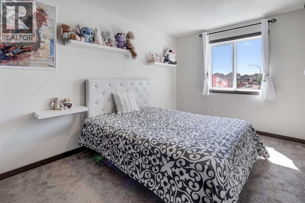 5 Covecreek Mews NE, Calgary, Alberta T3K 0V8 - Photo 23 - A2324736