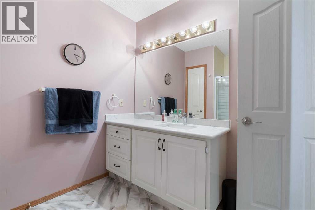 190 Woodpark Circle SW, Calgary, Alberta T2W 6G1 - Photo 30 - A2345617