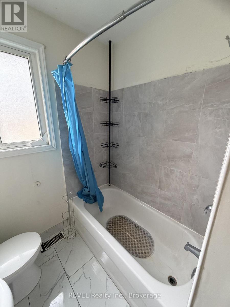 5974 Scott Street E, Niagara Falls, Ontario  L2E 3B4 - Photo 4 - X13797030
