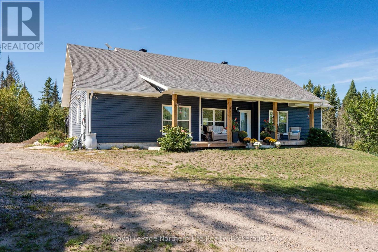 880 Memorial Park Drive E, Powassan, Ontario  P0H 1Z0 - Photo 2 - X13797278