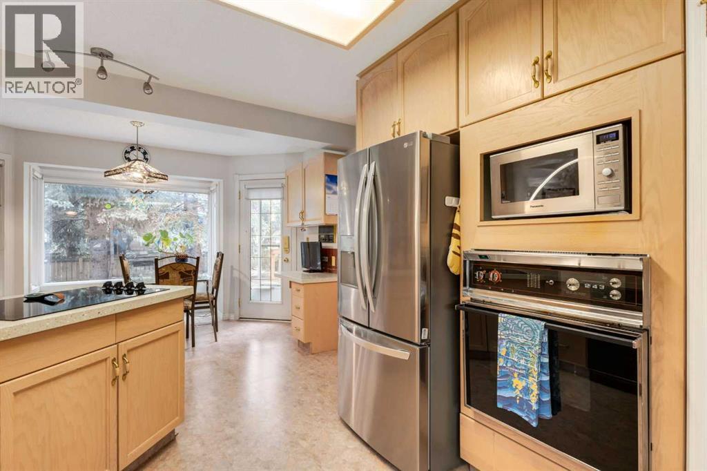 660 Coach Grove Road Sw, Calgary, Alberta  T3H 1C6 - Photo 9 - A2339456