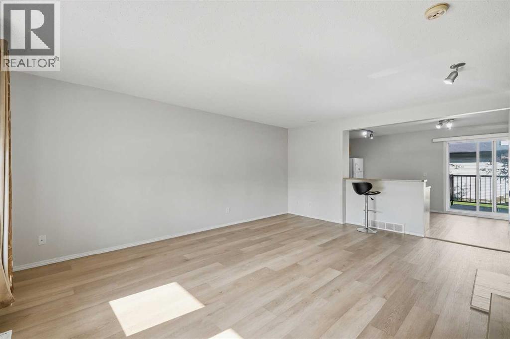 55 Panatella Park, Calgary, Alberta  T3K 6L5 - Photo 3 - A2345716