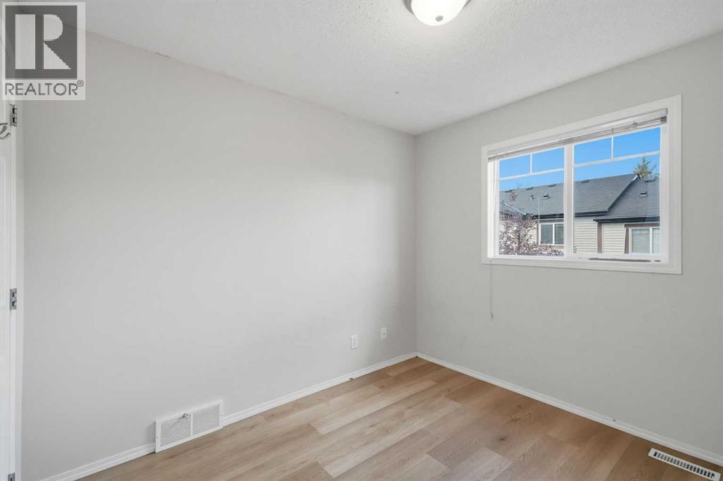 55 Panatella Park, Calgary, Alberta  T3K 6L5 - Photo 16 - A2345716