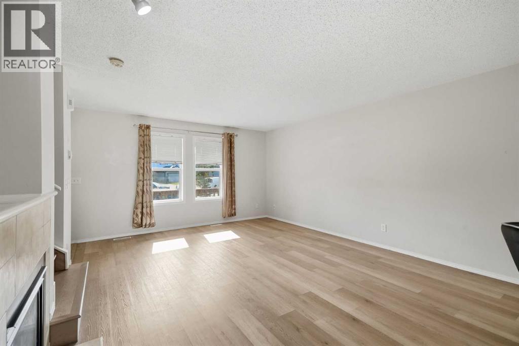 55 Panatella Park, Calgary, Alberta  T3K 6L5 - Photo 6 - A2345716