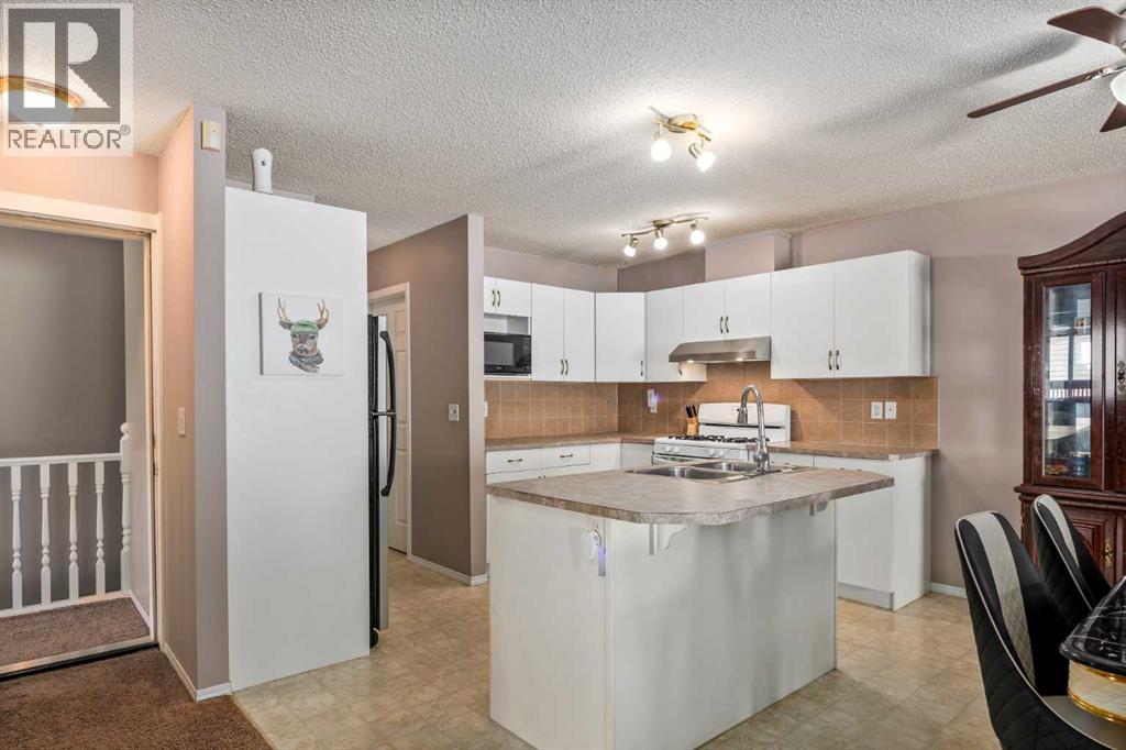 1458 Smith Avenue, Crossfield, Alberta  T0M 0S0 - Photo 7 - A2344752