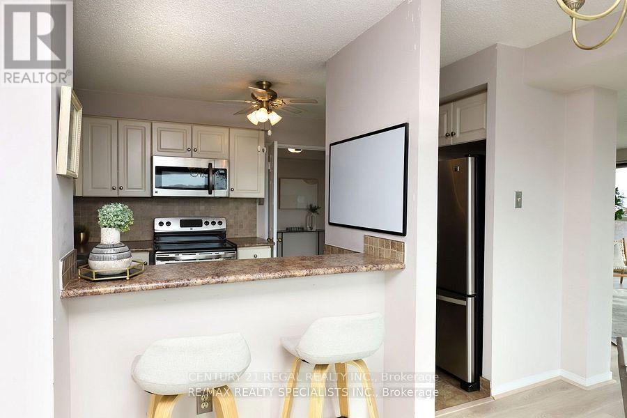 704 - 2155 Burnhamthorpe Road W, Mississauga, Ontario  L5L 5P4 - Photo 3 - W13799382