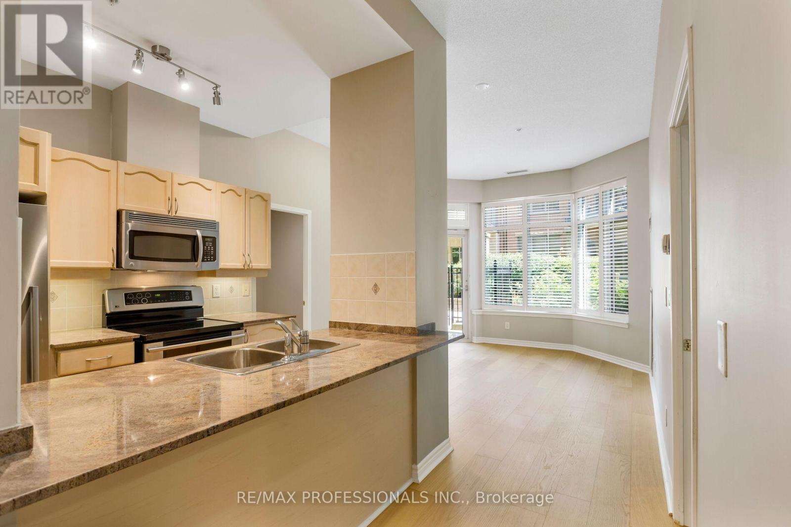 102 - 350 Princess Royal Drive, Mississauga, Ontario  L5B 4N1 - Photo 2 - W13799552