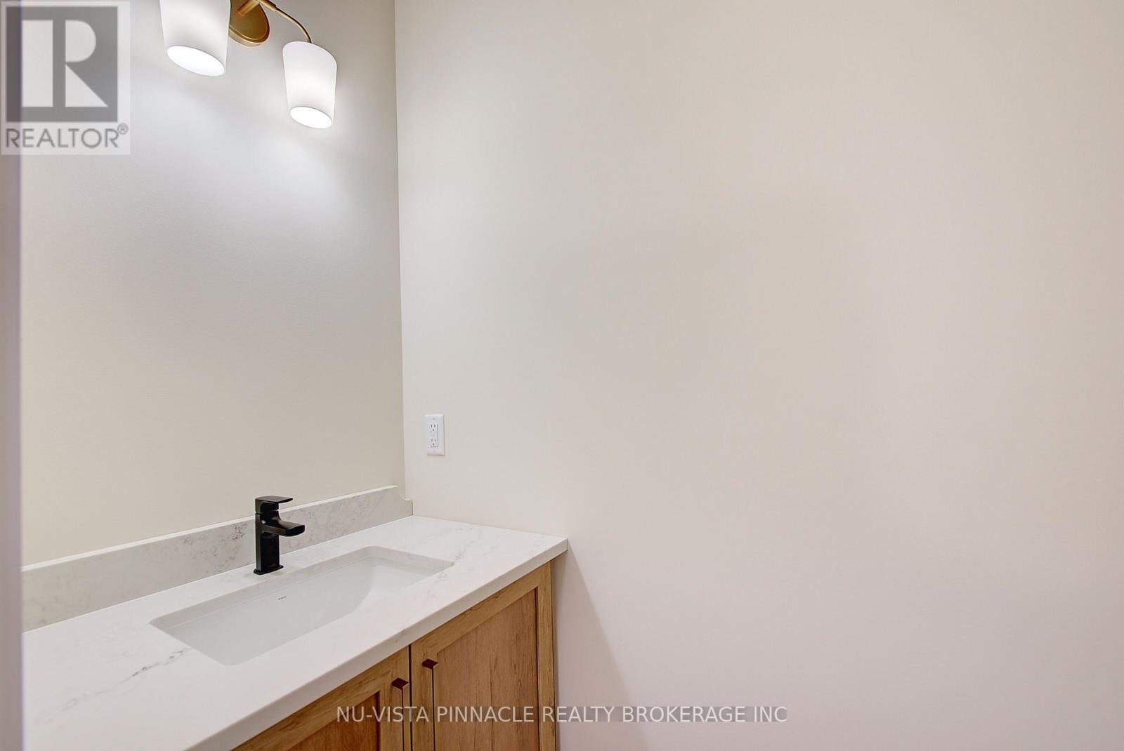 77 Basil Crescent, Middlesex Centre, Ontario  N0M 2A0 - Photo 23 - X13799712