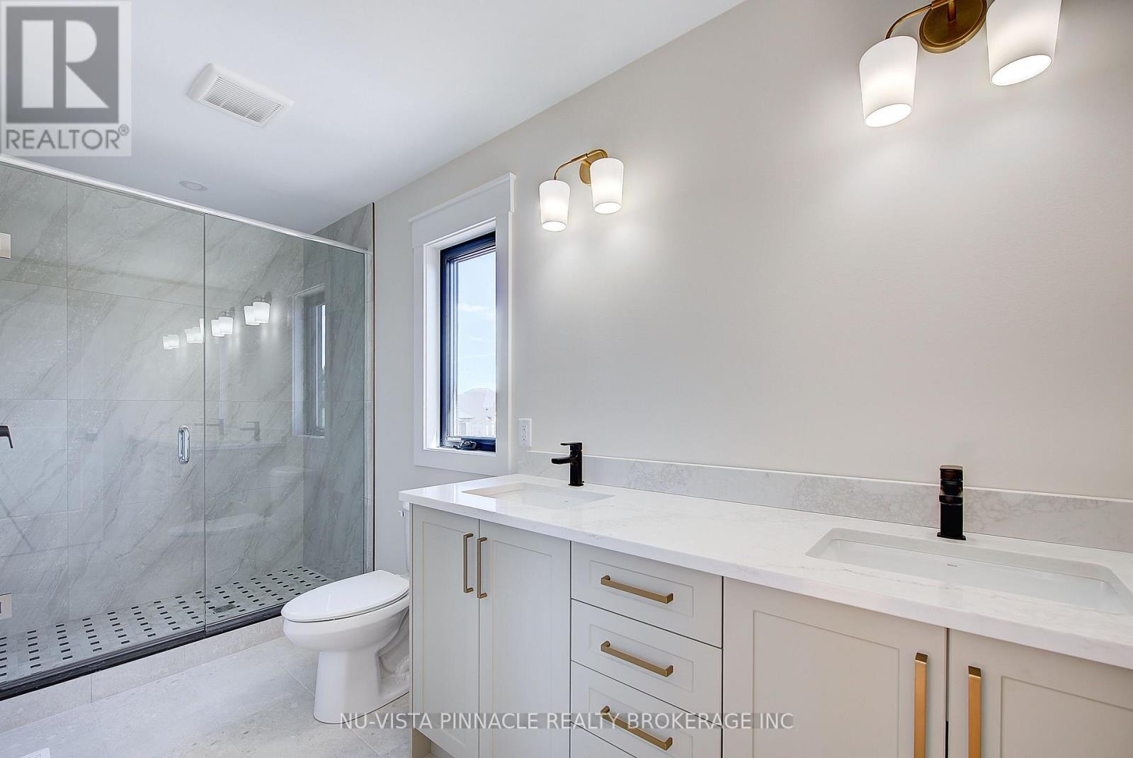 77 Basil Crescent, Middlesex Centre, Ontario  N0M 2A0 - Photo 28 - X13799712
