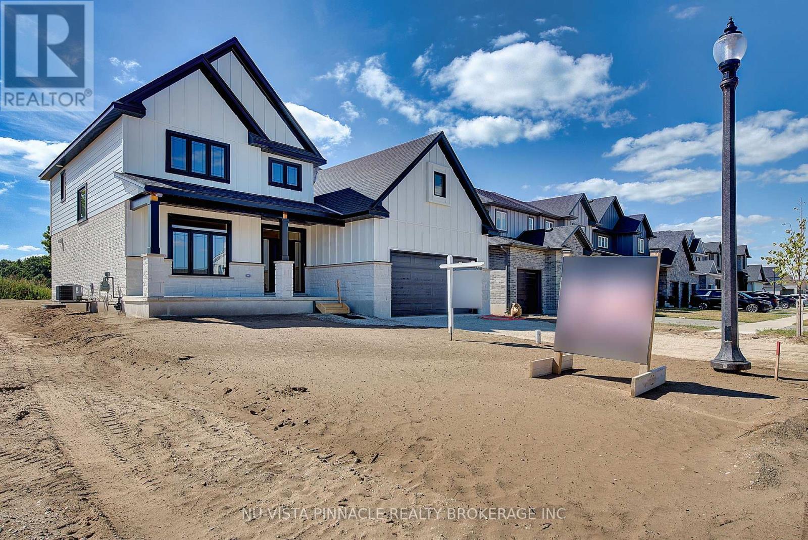 77 Basil Crescent, Middlesex Centre, Ontario  N0M 2A0 - Photo 3 - X13799712