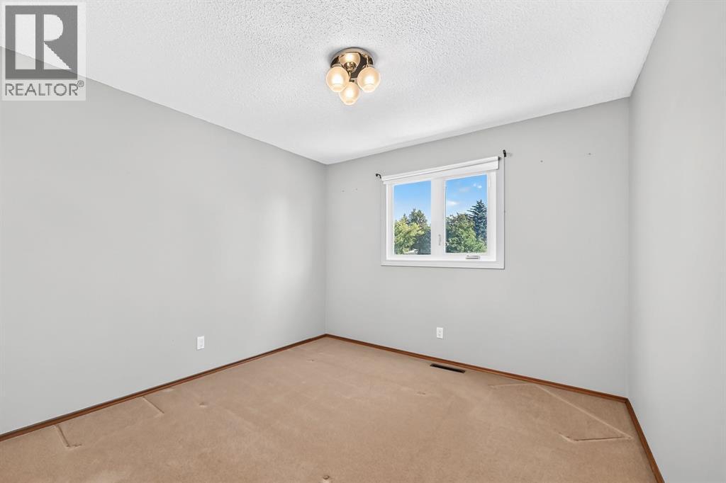 206 Huntham Place NE, Calgary, Alberta T2K 4G6 - Photo 18 - A2345619